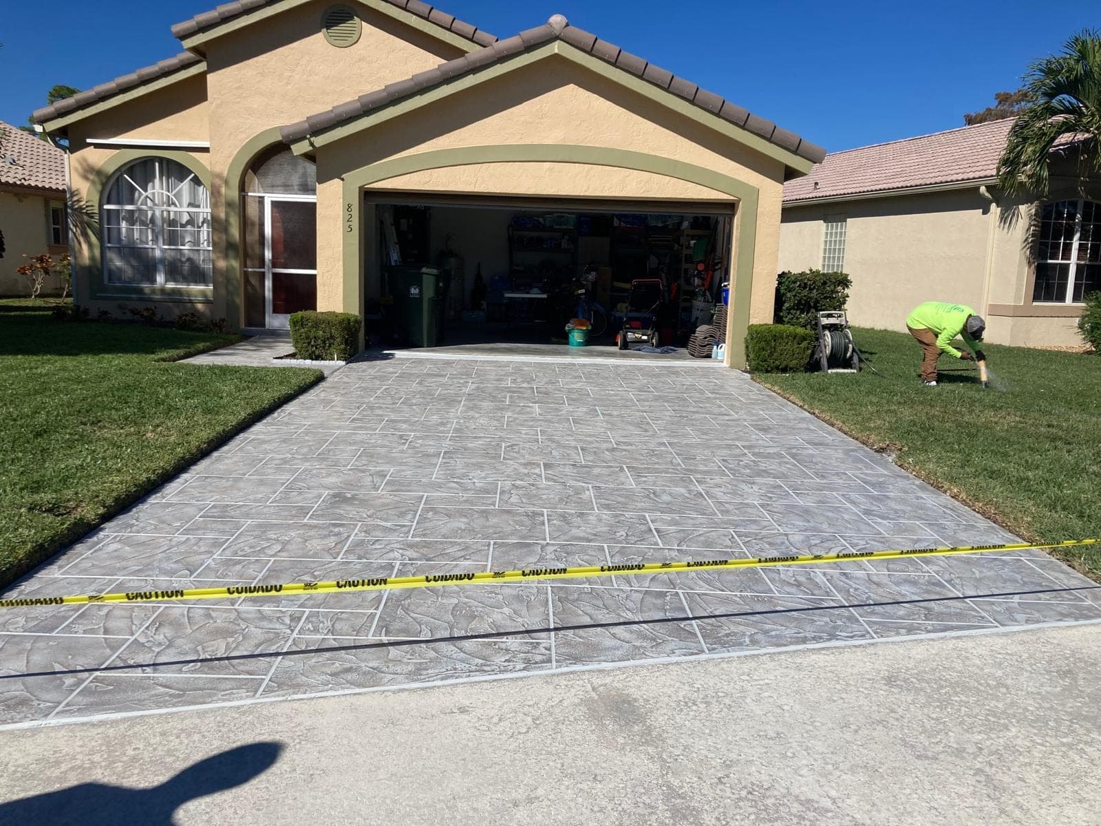 Grey tile stamped concrete entry