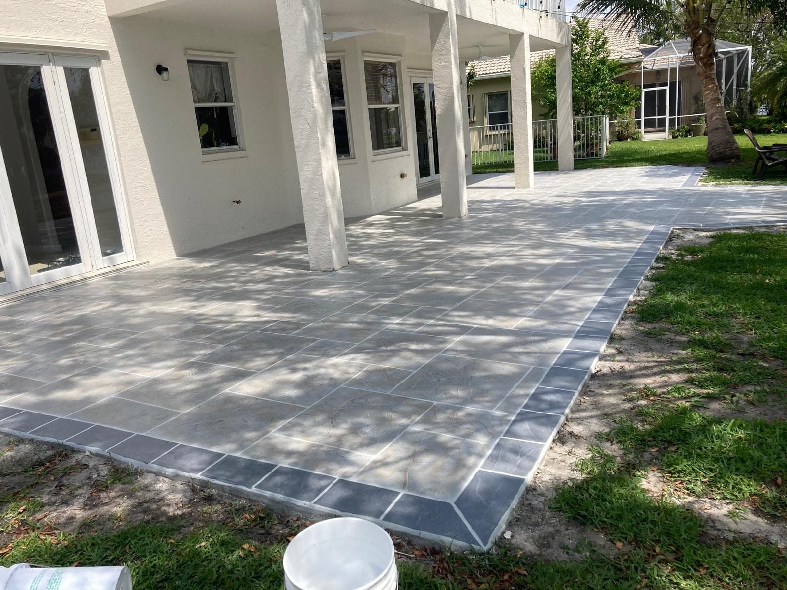 Grey border stamped concrete patio