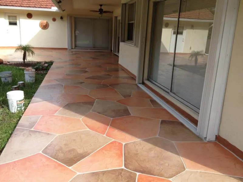 Decorative stamped concrete patio installed in Palm Beach County backyard