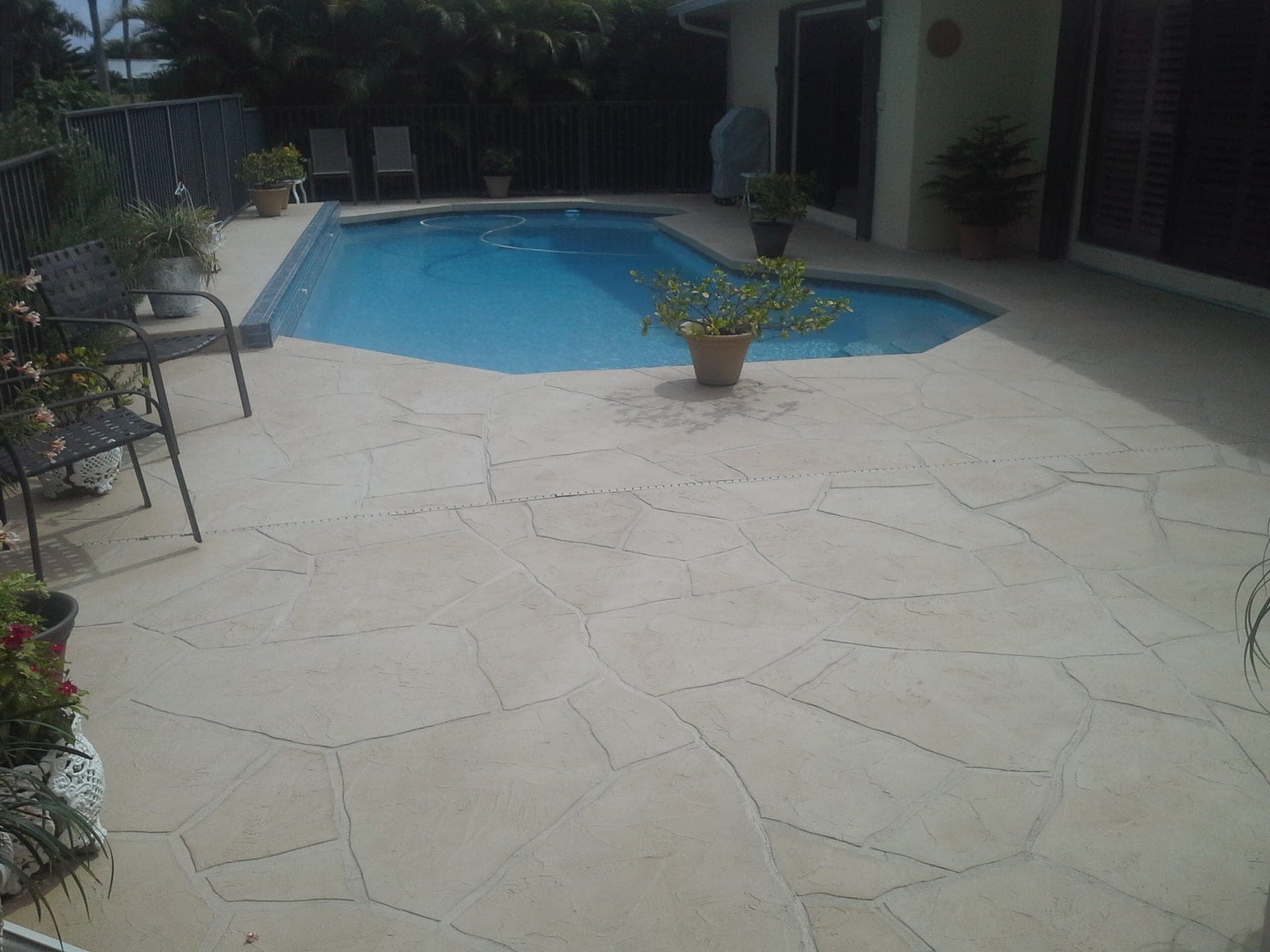 Pool deck repair and resurfacing completed