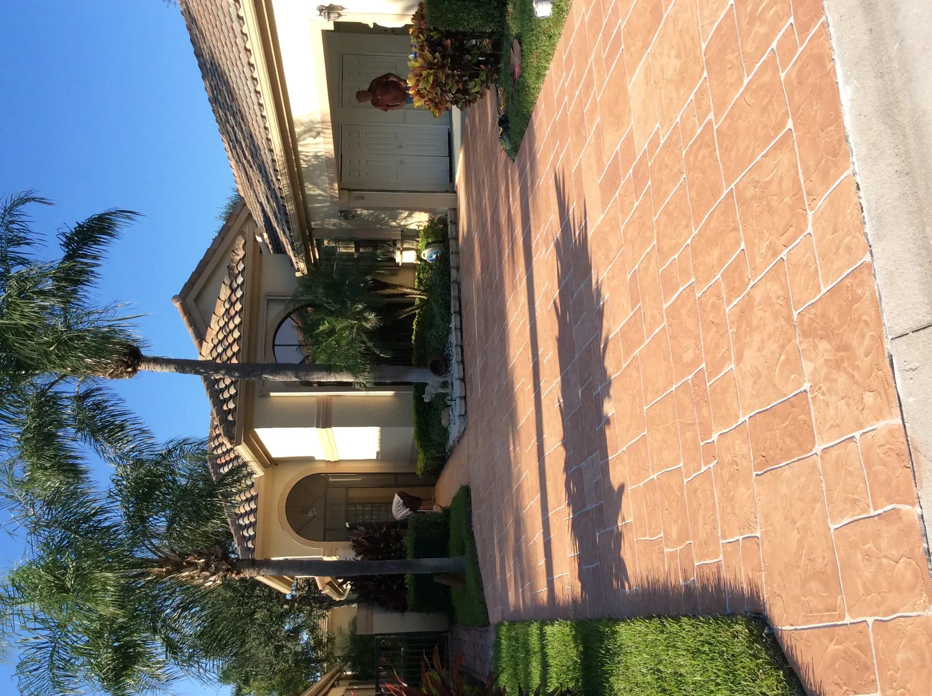 Stamped concrete driveway approved by Jupiter HOA community
