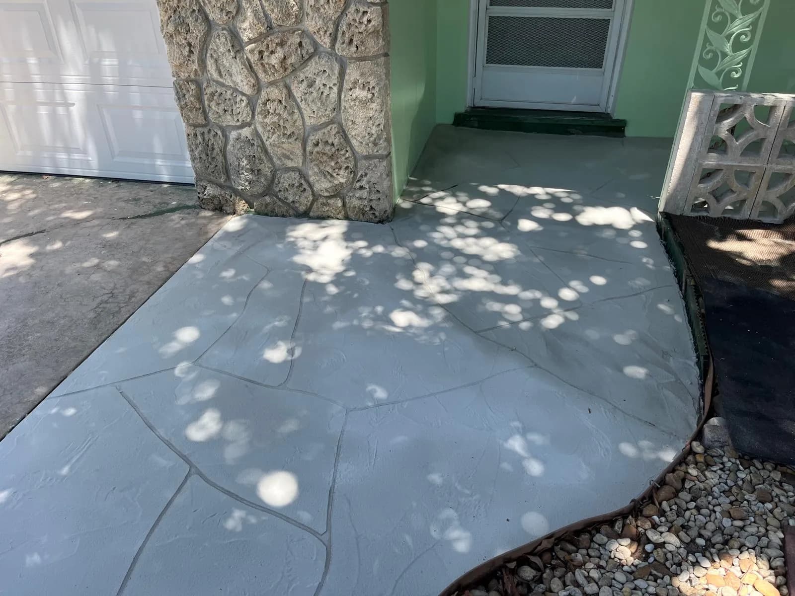 Completed concrete walkway project by licensed contractor